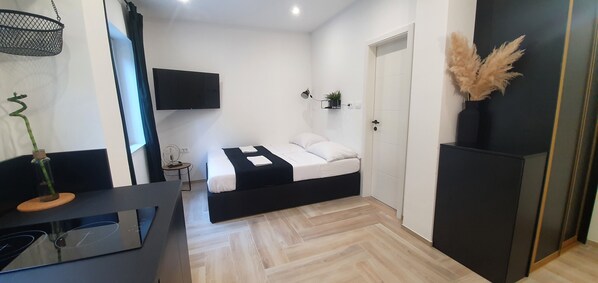 Elegant studio with modern black furniture