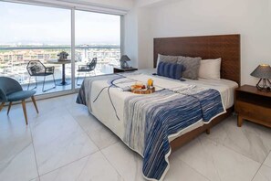 Spectacular view from king size bedroom with private balcony to the sail boats marine. 