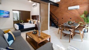 Living room with large sliding door to the first floor bedroom