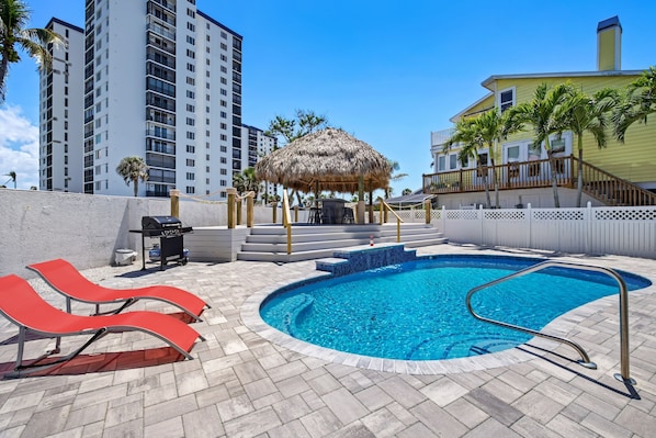 Welcome to Bayview Beach House! Pool has waterfall feature and Tiki Bar