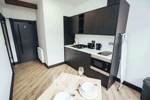 Small but mighty—this kitchenette includes all essentials for making your stay convenient and comfortable