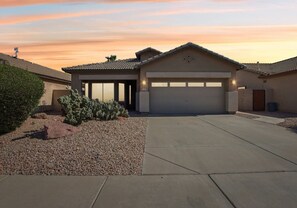 Front of house at sunset