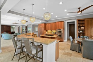 Chef's Kitchen: Sub Zero Fridge, 2 Sinks, Icemaker, Gas Range & Breakfast Bar