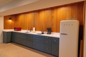 Full Kitchen with Cook top, Microwave, Refrigerator, Coffee Maker 