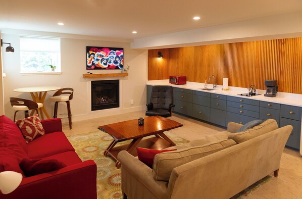 Main Living Room with Gas Fireplace and Smart TV 