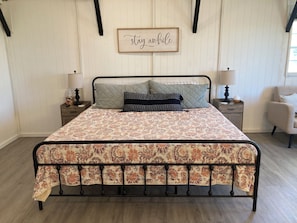 King memory foam mattress. Side tables with lamps and electric/USB outlets