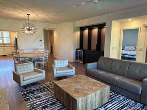 Living room with leather couch and chairs seating