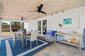 This screened in patio will be the scene of many fun dinners, board game challenges, puzzles and morning coffees.