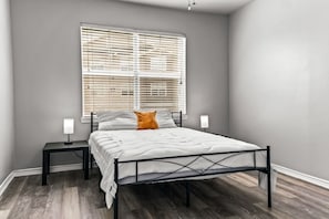 You’ll feel enveloped in warmth in this charming room with its rich wood accents and inviting bed. Wake up refreshed, surrounded by rustic coziness, and enjoy the perfect mix of comfort and natural vibes