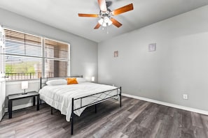 You’ll feel enveloped in warmth in this charming room with its rich wood accents and inviting bed. Wake up refreshed, surrounded by rustic coziness, and enjoy the perfect mix of comfort and natural vibes