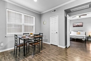 You are surrounded by tasteful decor and warm tones, making the dining room a perfect setting for any occasion.