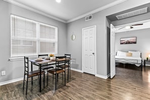 You are surrounded by tasteful decor and warm tones, making the dining room a perfect setting for any occasion.