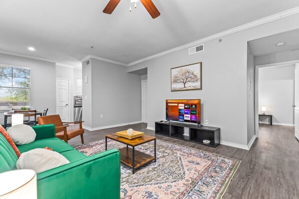 As you take a seat in the living room, the comfortable furniture and tasteful design make it easy to unwind.
