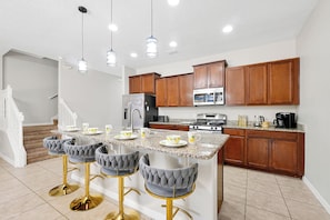 Kitchen bar with seating—great for breakfast or quick snacks
