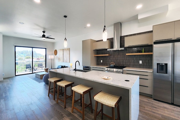 Gourmet kitchen and open concept living.
