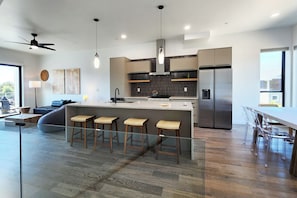 Large island with seating at the counter.