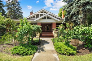 Grand Entrance with Lush Garden Path