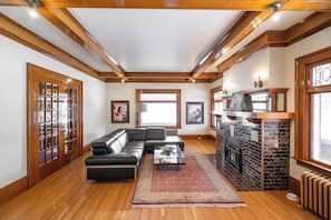 Leather sectional + wood accents