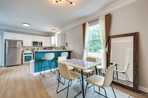 Dining Area | Dishware & Flatware | Central A/C & Heat | 1st Floor