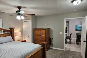 Second Bedroom with King-Size Bed, and Ceiling Fan. Private Entrance to Back Deck.