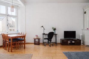 Step into a bright and airy living space designed for both relaxation and productivity.