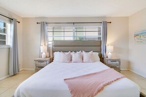 Relax and in our soft king-size bed on our Master's bedroom at unit 2 and its cozy interior.
