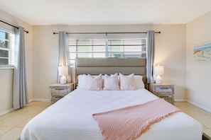Relax and in our soft king-size bed on our Master's bedroom at unit 2 and its cozy interior.