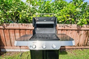 We have a brand new grill ready to go in the backyard!