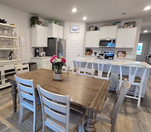 Dining table seats 6, island seats 4
