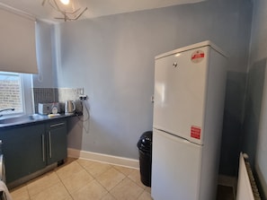 This photo represents the kitchen of the flat