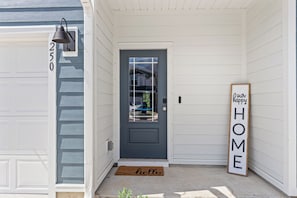 Welcoming entryway with a modern design, offering a stylish first impression