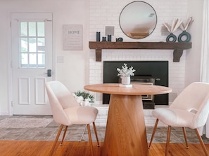 Cozy dining nook by fireplace