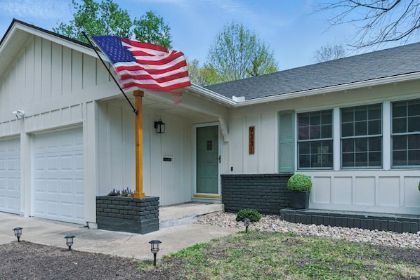 Charming home with a classic exterior and welcoming entrance. Easy garage access