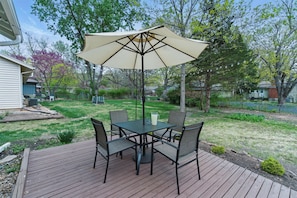 Unwind on the private patio with a cold drink under the shade.