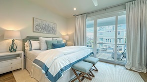 Master bedroom with king bed, ensuite bathroom and private porch.