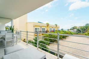 Terrace has a partial ocean view; soak in the scenery.