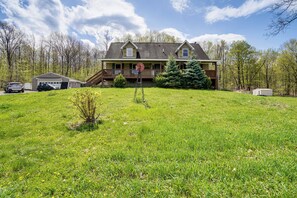 Property Exterior | Gas Grill | Covered Porch | Fire Pit | Spacious Yard