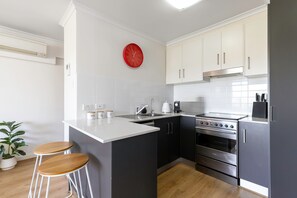 Kitchen with all needed accessories. Coffee Pod machine (Espressotoria). Filtered water, Microwave, Dishwasher, Airfryer, Oven, Stove and fridge/freezer. 