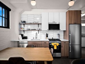 Fully equipped kitchen and dining area