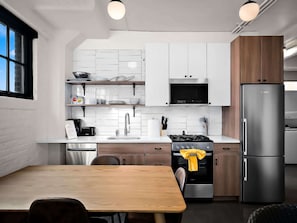 Fully equipped kitchen and dining area