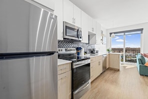 As you step into the kitchen, the clean lines and functional design make you eager to start cooking your favorite dishes.