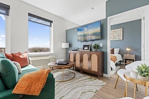 As you take a seat in the living room, the comfortable furniture and tasteful design make it easy to unwind.