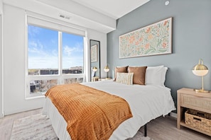 Spacious bedroom with stylish decor, perfect for unwinding after a day of exploring the local area.