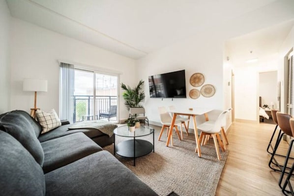 Relax in the living room and watch your favorite shows, lounging is a great way to unwind after a long day.