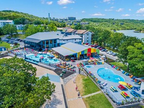 Dive into summer fun at Rock Lane's brand-new infinity pool! Lounge under colorful umbrellas, sip tropical drinks at the swim-up bar, and soak in those gorgeous Table Rock Lake views — all just steps from your condo.