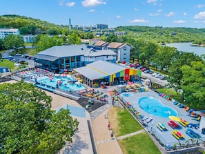 Dive into summer fun at Rock Lane's brand-new infinity pool! Lounge under colorful umbrellas, sip tropical drinks at the swim-up bar, and soak in those gorgeous Table Rock Lake views — all just steps from your condo.
