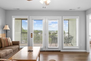 Open the door to endless lake views! Relax on your private balcony with morning coffee or sunset drinks and soak in the stunning Table Rock Lake scenery right from your living room.