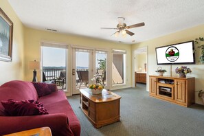Living area with Cable TV, Deck Access, Lake View