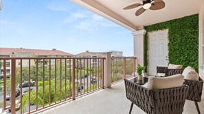 Private outdoor balcony with dining area