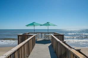 Relax in your very own deck with ocean views and direct beach access.